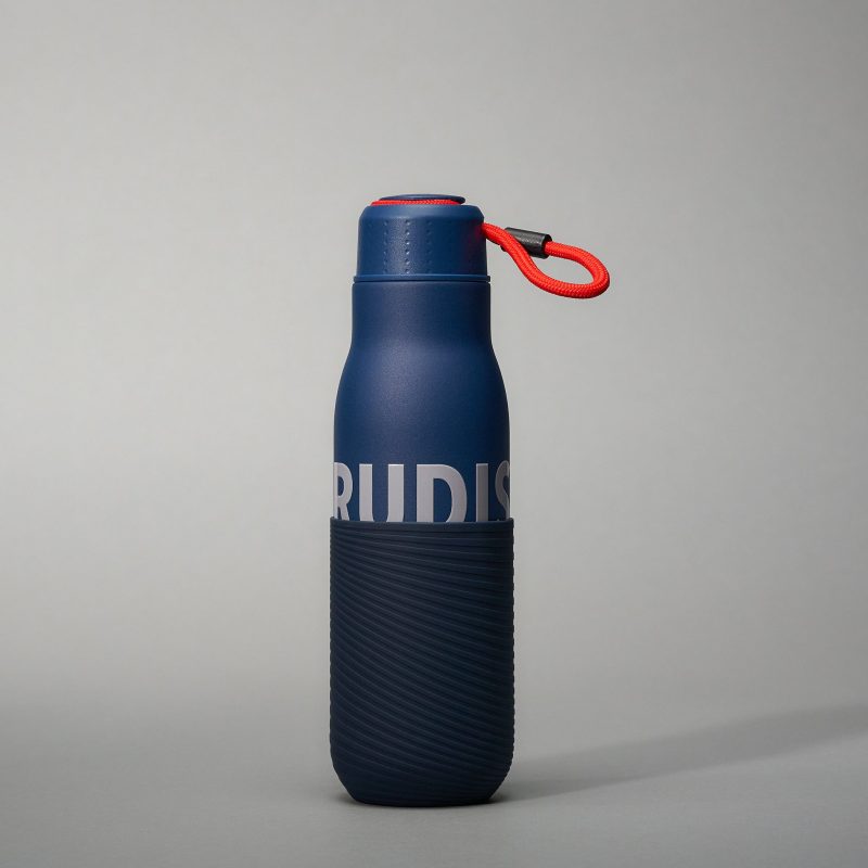 A modern navy blue water bottle featuring a textured lower grip and a bold logo on its side suited for active lifestyles