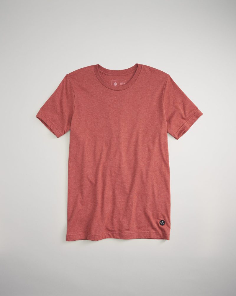 This image showcases a casual red t-shirt with a simple design emphasizing comfort and versatility for everyday wear